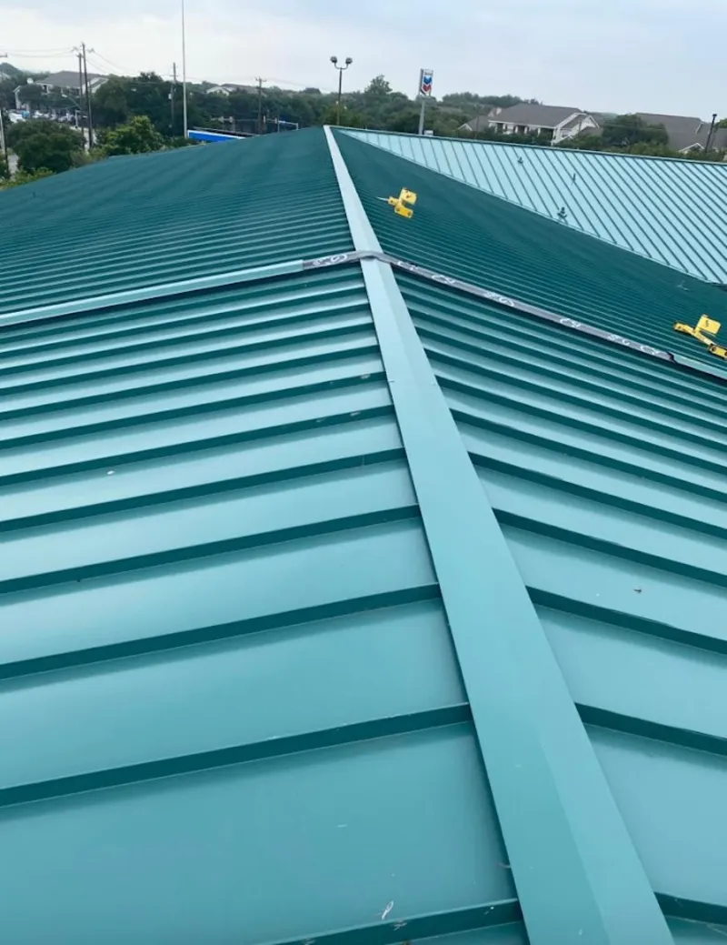 Green commercial metal roof ridge and valley for Metal Roof Repair in Georges